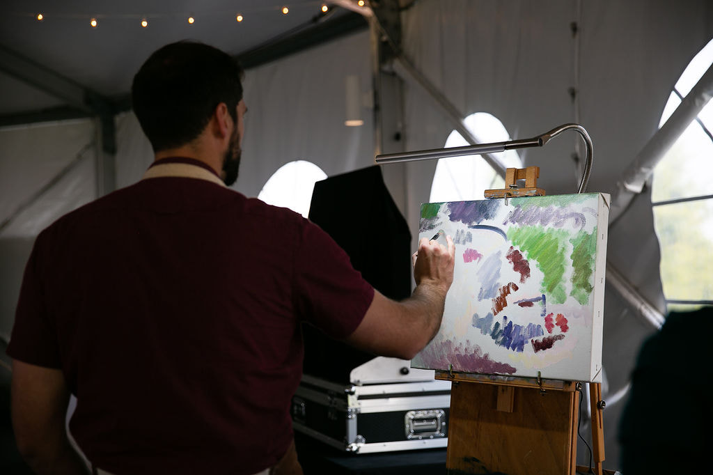John Folley painting live at an event. What is Live Painting and how much does it cost?